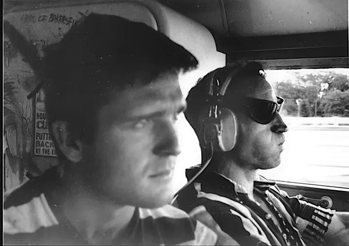 Ken Babbs Neal Cassady 1964 on the bus. Photo courtesy of Google Archives (1) copy Enlarged copy